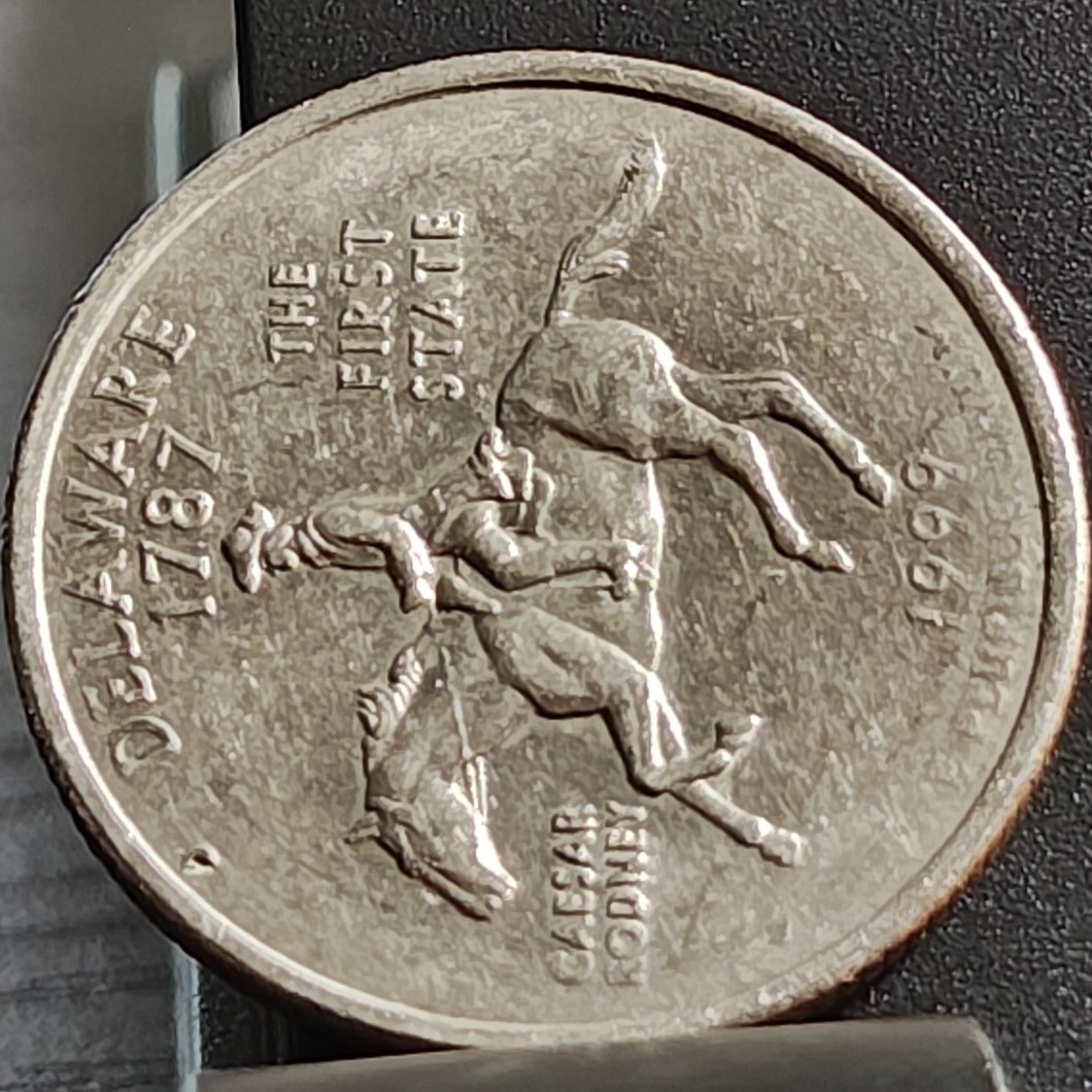 Weird-1999-D-Delaware-Quarter-Die-Chips-?